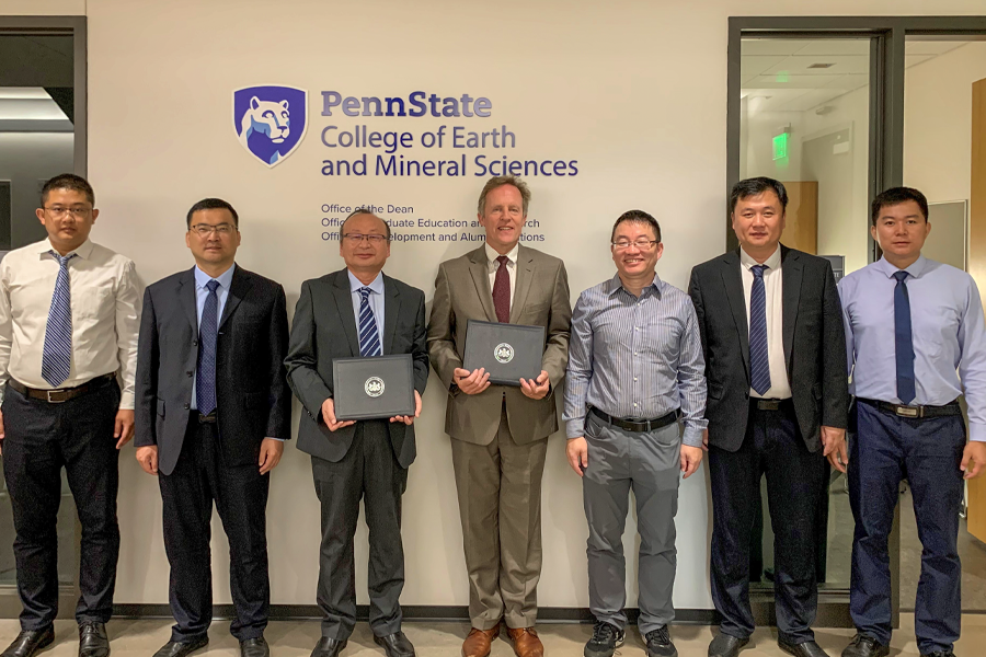 A delegation from the Shandong University of Science and Technology with Lee Kump, John Leone Dean in the College of Earth and Mineral Sciences at Penn State, and Shimin Liu, the George H., Jr. and Anne B. Deike Chair in Mining Engineering and professor of energy and mineral engineering. Credit: Penn State. Creative Commons