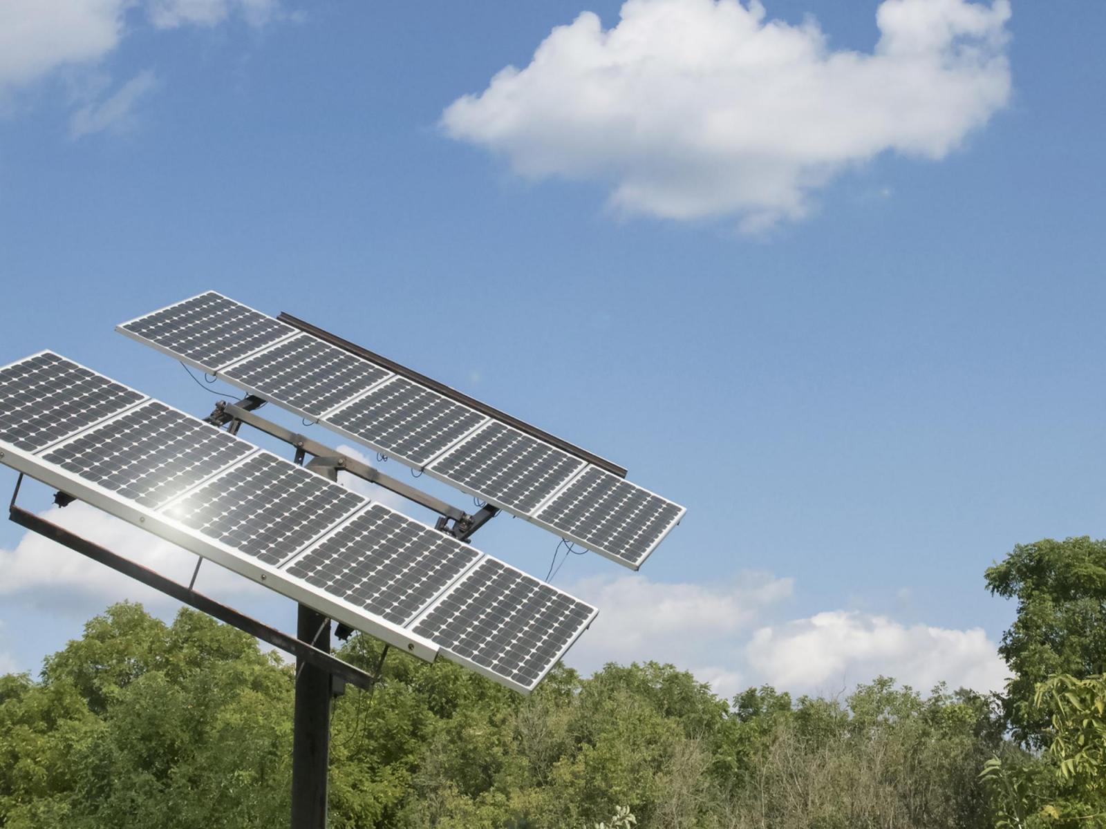 Image of a solar panel against a blue sky.