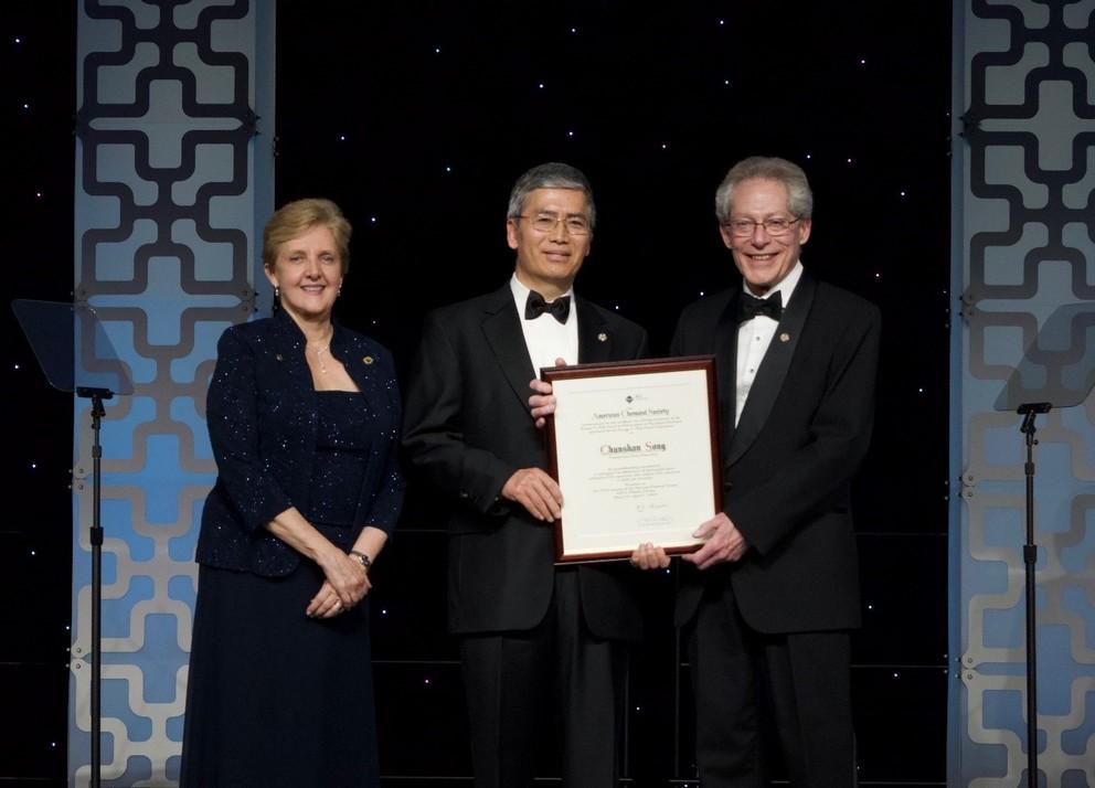 Chunshan Song is presented his award